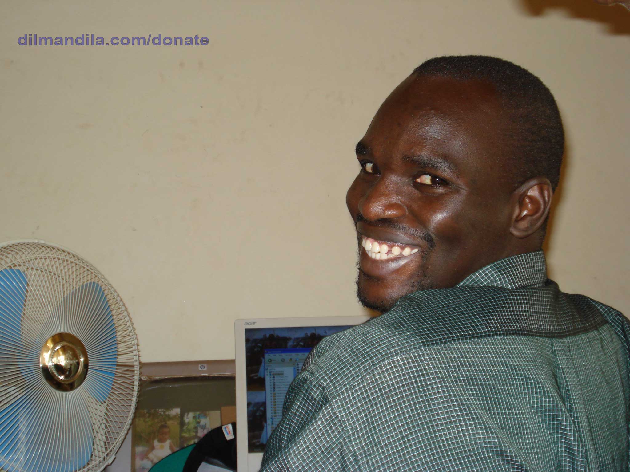 Dilman Dila doing office work